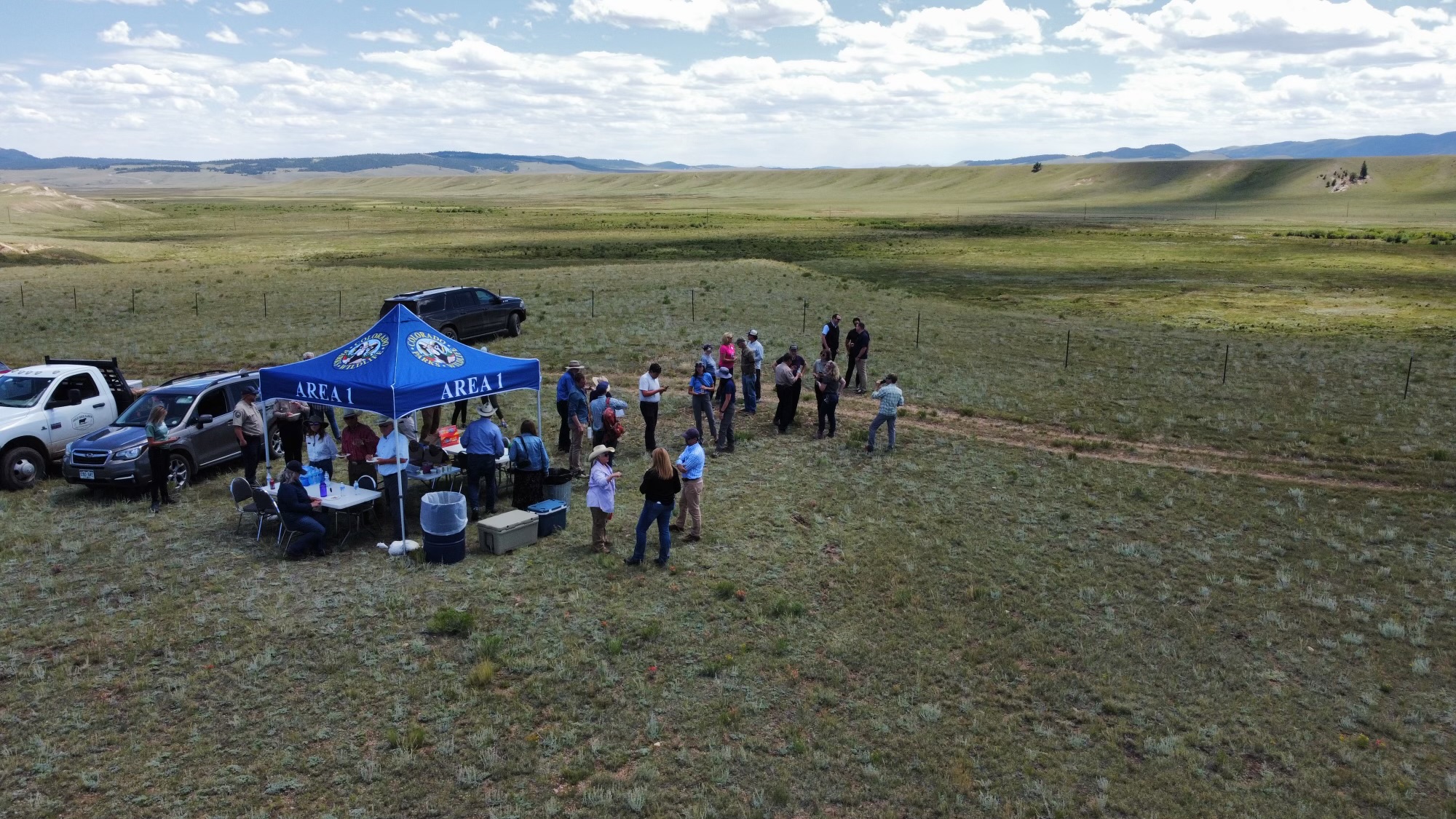 Aerial image of land and CPW Tent